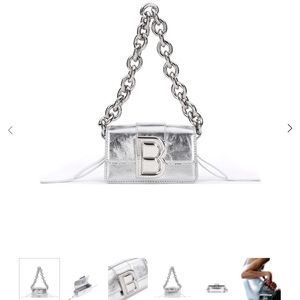 Brandon Blackwood Mini Nia in metallic silver. Great condition, Only worn once.